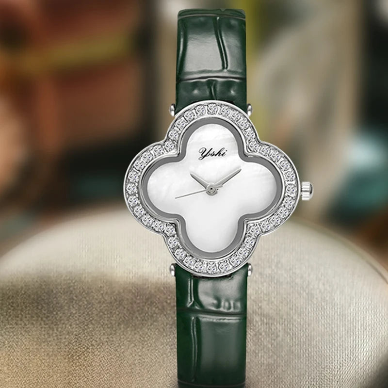 A women's modern minimalist four-leaf clover forest-style green PU leather quartz watch that brightens the skin tone