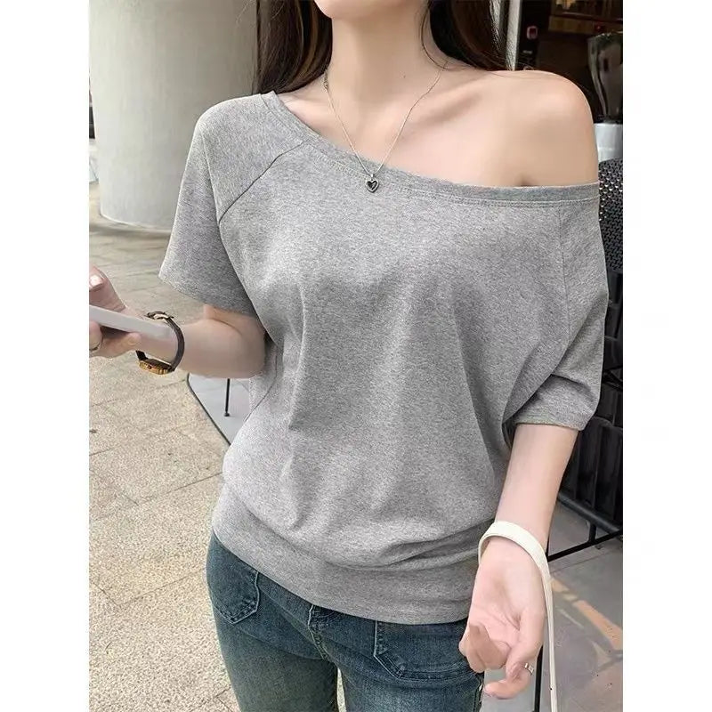 1 t-shirt d'été basique de couleur unie pour femme - T-shirt à col oblique et manches courtes pour femme, style urbain, coupe sexy et ajustée