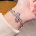 Luxury Women's Gold Rhinestone Flower Pop Bracelet