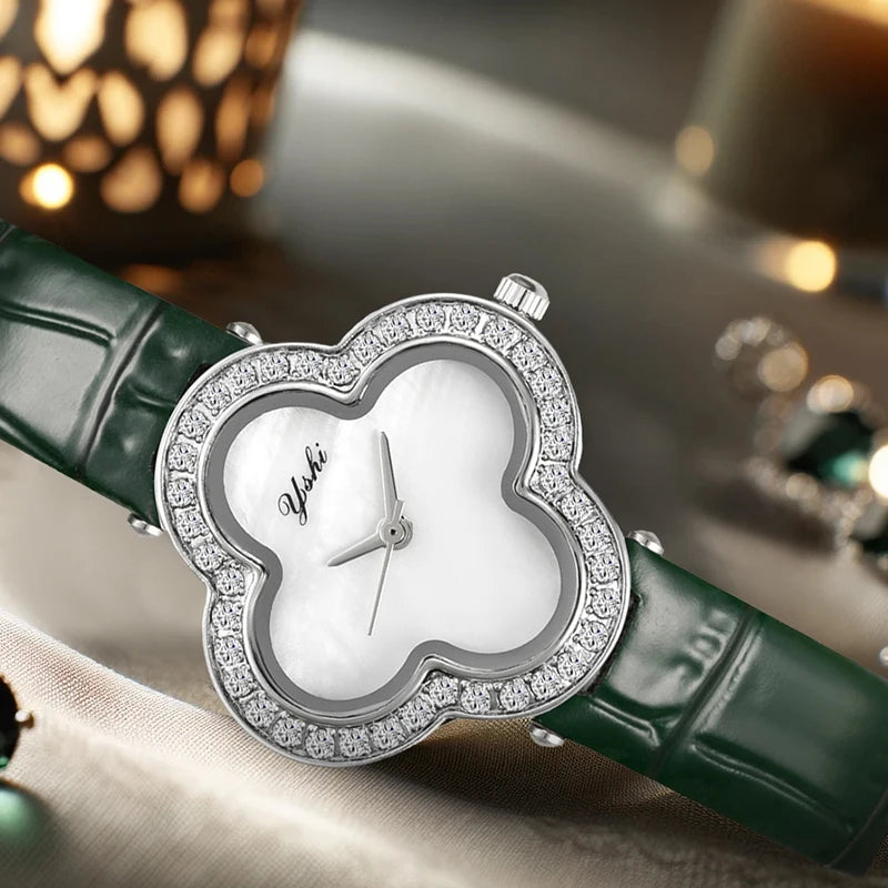 A women's modern minimalist four-leaf clover forest-style green PU leather quartz watch that brightens the skin tone