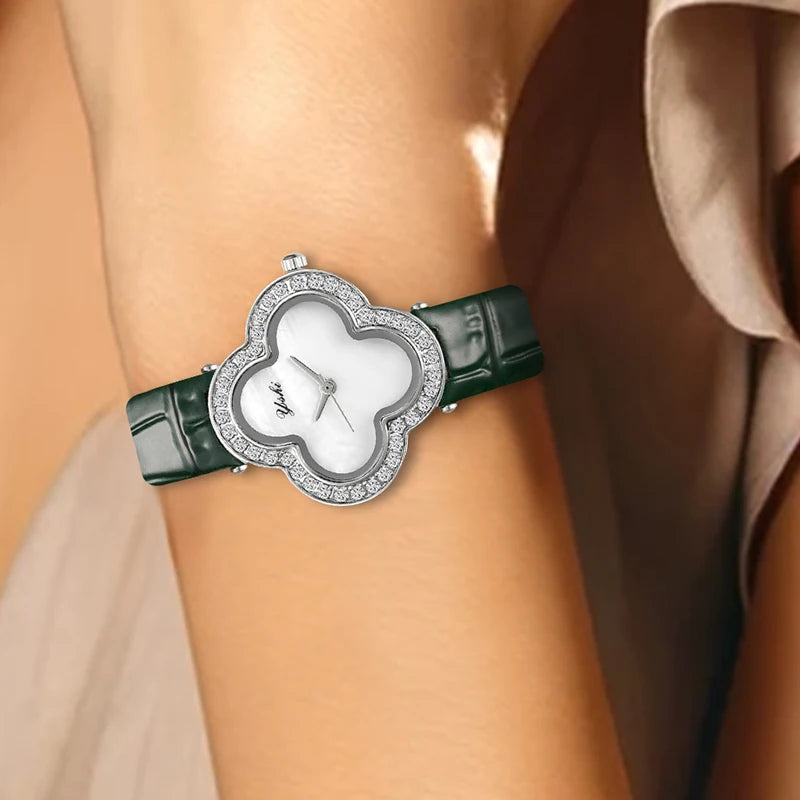 A women's modern minimalist four-leaf clover forest-style green PU leather quartz watch that brightens the skin tone