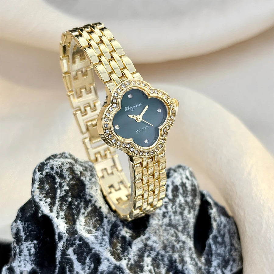 Montre délicate trèfle doré vintage pour femme avec verre bombé