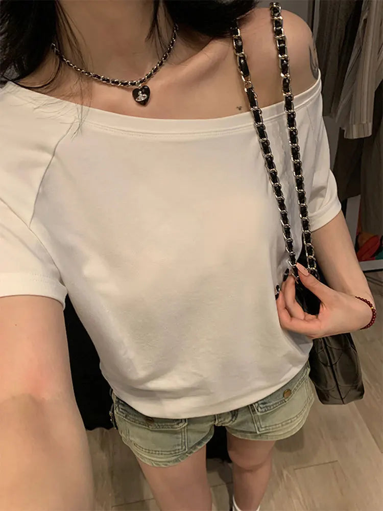 1 t-shirt d'été basique de couleur unie pour femme - T-shirt à col oblique et manches courtes pour femme, style urbain, coupe sexy et ajustée