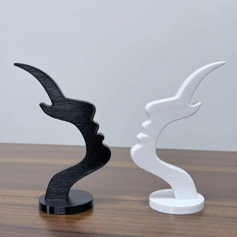 حامل نظارات بتصميم وجه جانبي ثلاثي الأبعاد بشكل بسيط على هيئة وجه إنسان، مناسب للنظارات كقطعة ديكور عملية وممتعة لمكتبك بطابع الفن التجريدي.