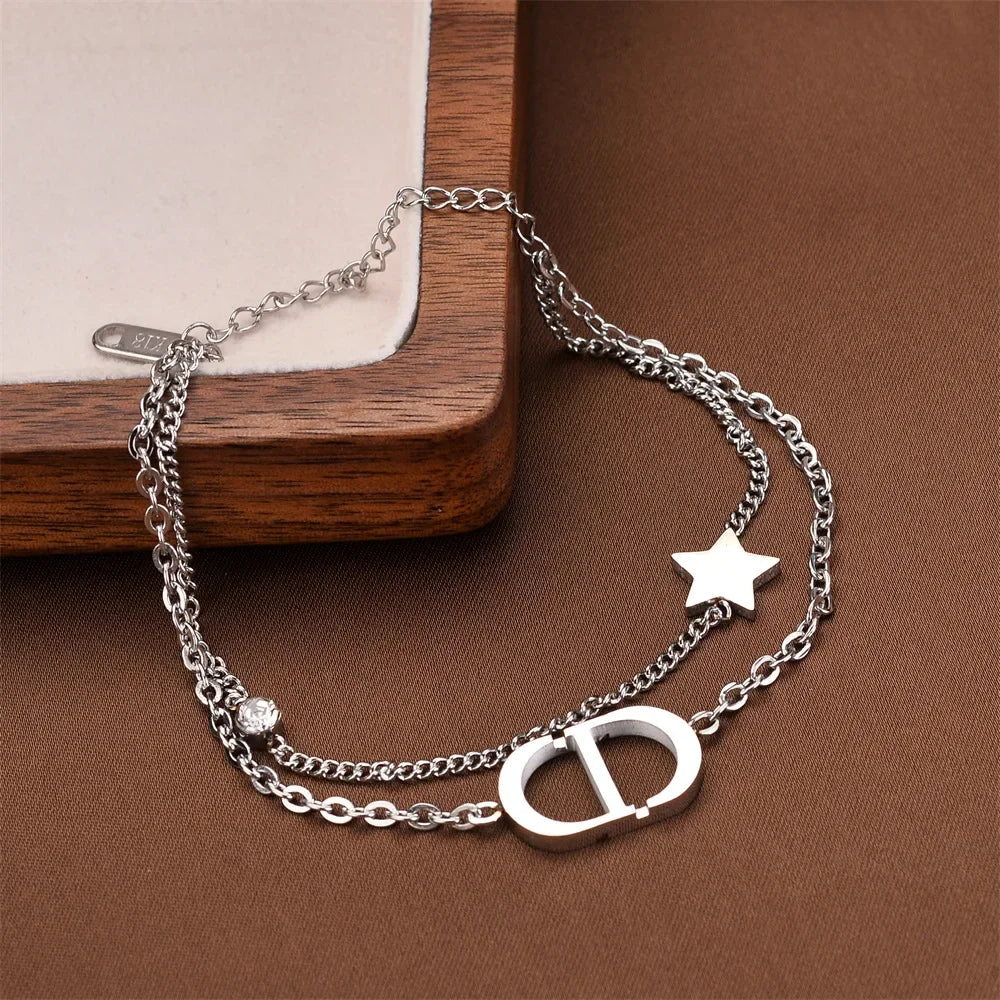 Bracelet double couche en acier titane à la mode avec lettre étoile Design élégance simple port quotidien style unique bijoux à main